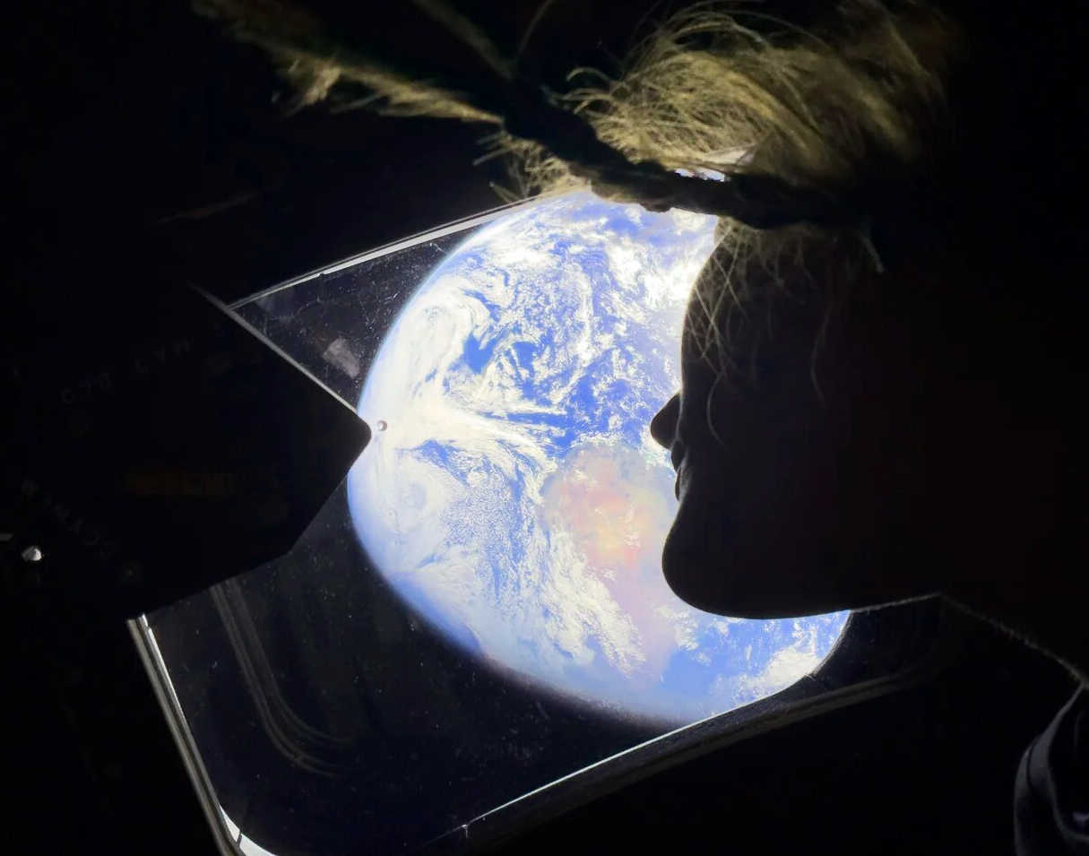 Technology overview; Earth out of window from Artemis 2